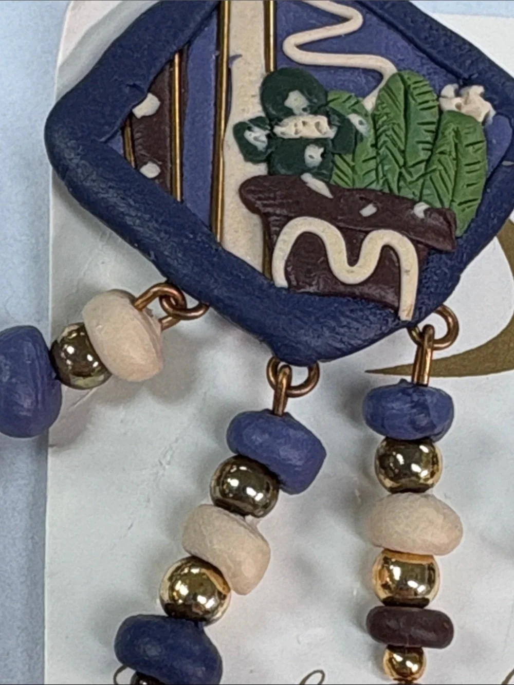 Doncaster Purple and Cream Beaded Drop clip on Earrings with Green Accents